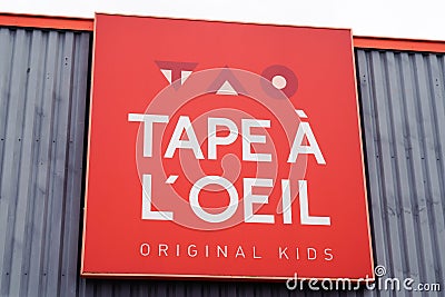 Tape Ã  l`oeil logo brand and text sign storefront signage front of fashion clothing Editorial Stock Photo